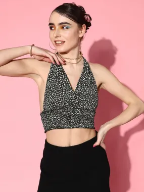 Berrylush Women Black & White Floral Printed Halter Neck Sleeveless Tie-Up Backless Smocked Crop Top